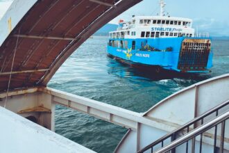 Passenger ferry traveling across open water in the Philippines