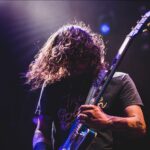 Rock guitarist performing live on stage