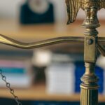 Scales of justice illustrating the American Bar Association’s law-school accreditation decision.