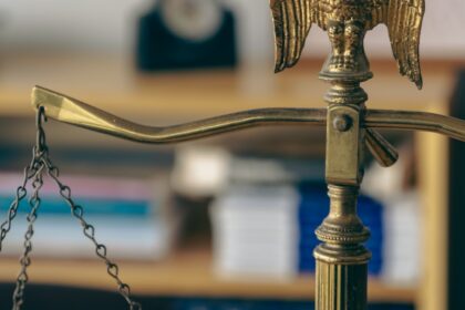 Scales of justice illustrating the American Bar Association’s law-school accreditation decision.