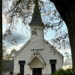 Small-town church with white steeple
