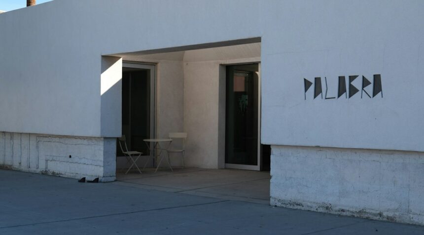 Southern California commercial building with palm trees