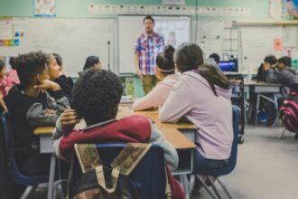 Students in a classroom during a presentation