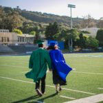 Students in graduation attire, illustrative photo