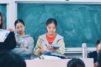 Students reading and learning together in a classroom