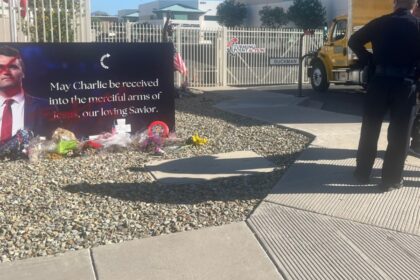 The vandalized Charlie Kirk memorial statue outside Turning Point USA headquarters in Phoenix
