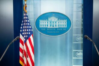 White House press briefing room representing television pool coverage dispute