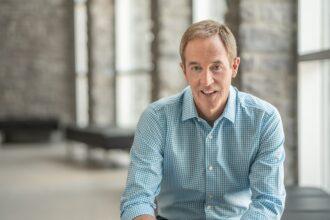 Andy Stanley smiling in an archival portrait.