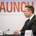Elon Musk seated at a NASA launch briefing in May 2020.