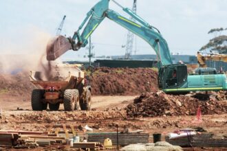 Excavator at a construction site, illustrative stock photograph; not Rancho Soñado