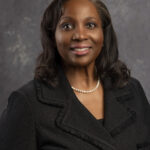 Official 2022 portrait of Federal Reserve Governor Lisa D. Cook.