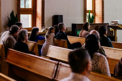 People seated in church pews