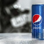 Pepsi can on a table, illustrative product photograph