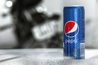 Pepsi can on a table, illustrative product photograph